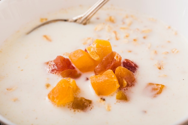 Close-up of oatmeal with fruits topping