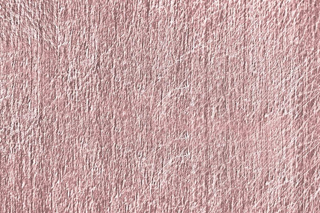 ピンク​の​傷ついた​コンクリート​の​壁​の​質感​の​クローズアップ
