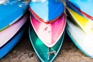 Free photo close-up of old canoe stacked