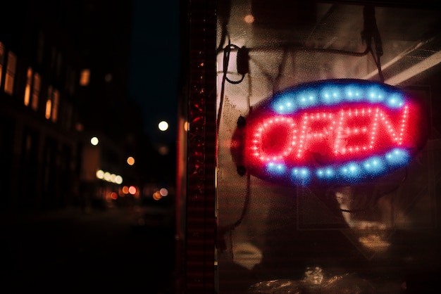 Close-up open sign in neon lights 