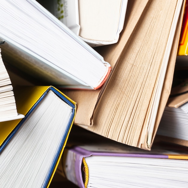 Close-up opened books on table