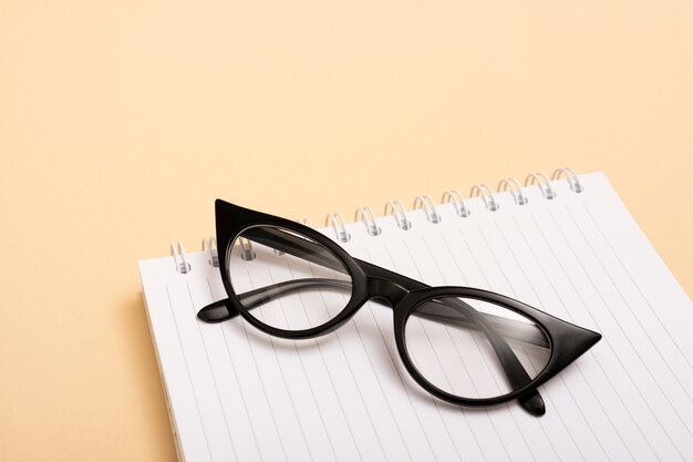 Close-up optical eyeglasses on a notebook