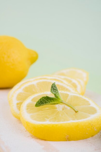 Close-up organic lemon slices with mint