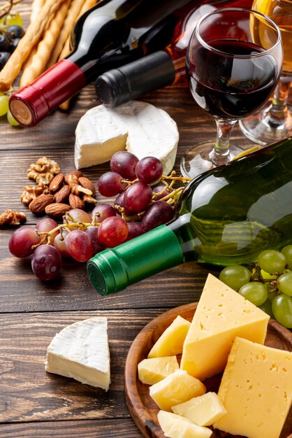 Close-up organic wine and cheese on table