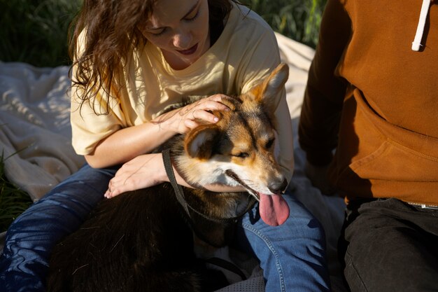 Close up owners with cute dog