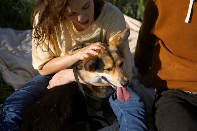 Close up owners with cute dog