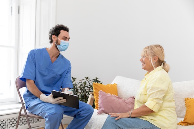 Close up on pacient talking to doctor about vaccine