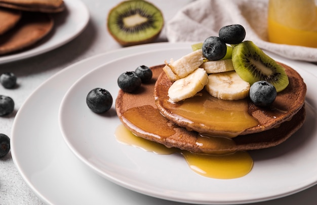 Close-up pancakes with fruits