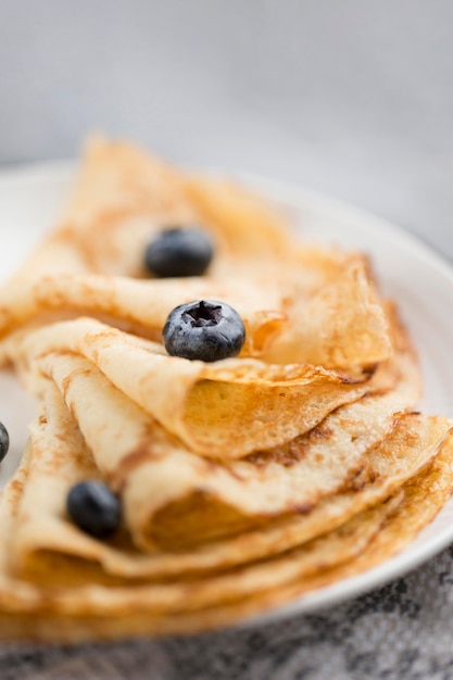 Close-up pancakes with fruits