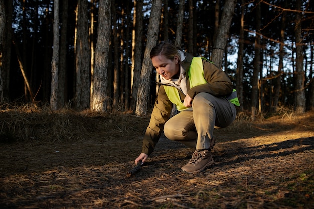 Close up on park ranger in woods