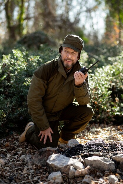 Close up on park ranger in woods