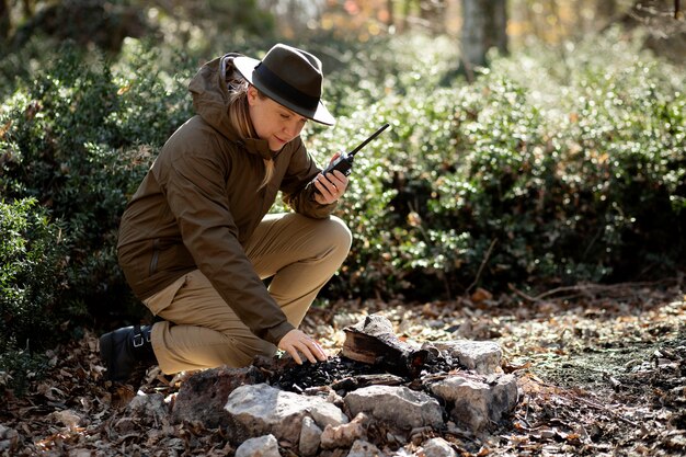 Close up on park ranger in woods