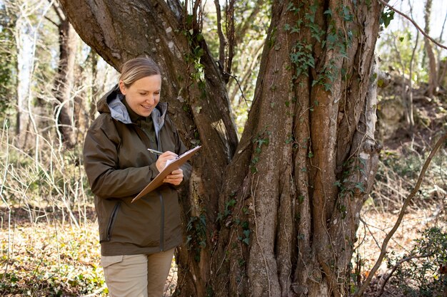 Close up on park ranger in woods