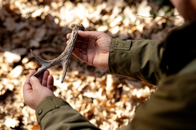 Close up on park ranger in woods