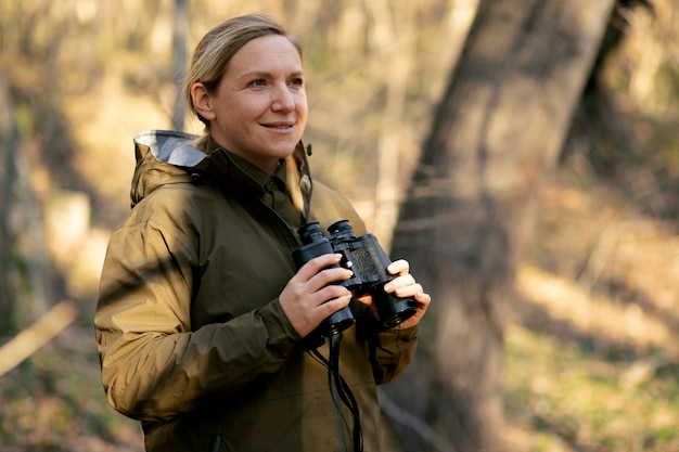 Free photo close up on park ranger in woods