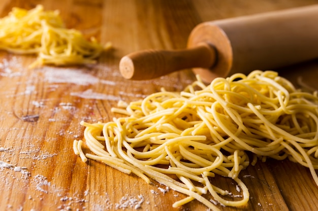 Close-up of pasta and roller