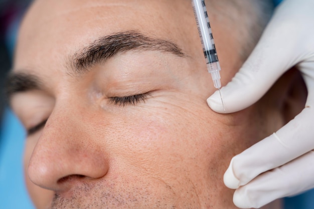 Close up patient and syringe