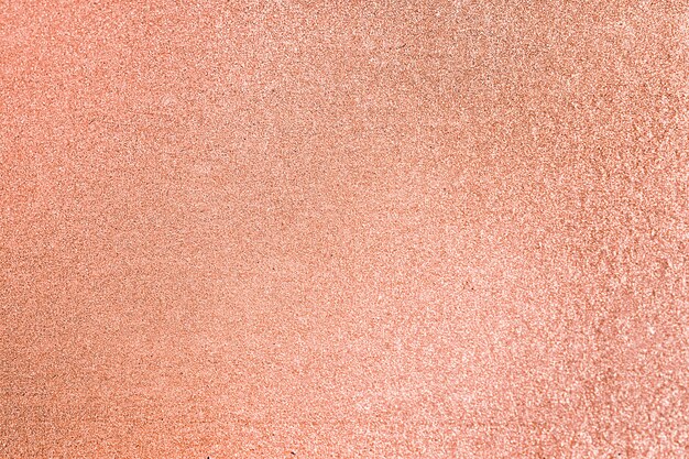 Close up of peach glitter textured background