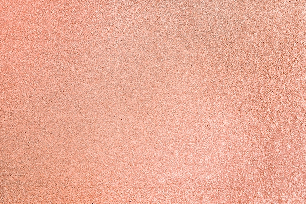 Close up of peach glitter textured background