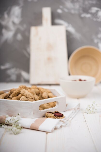 Close-up peanuts on wooden table