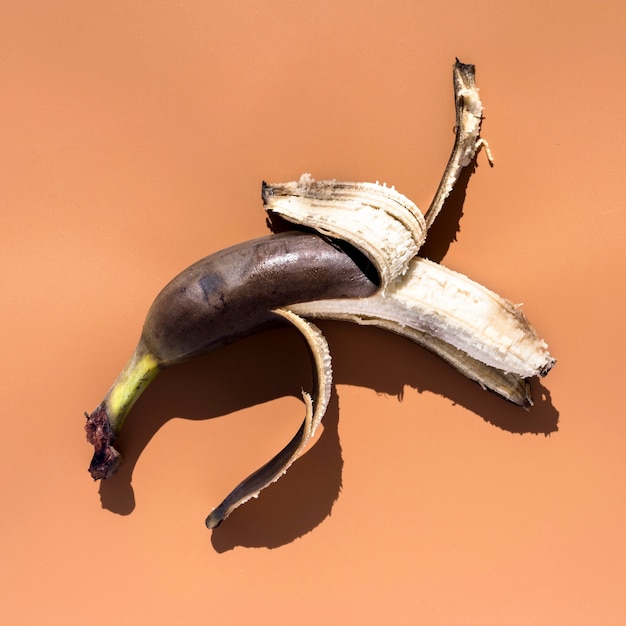 Close-up peeled ripe banana