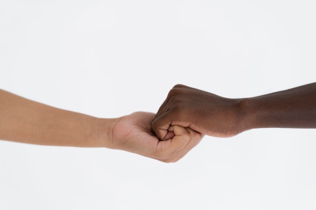 Close up on people connecting through hands