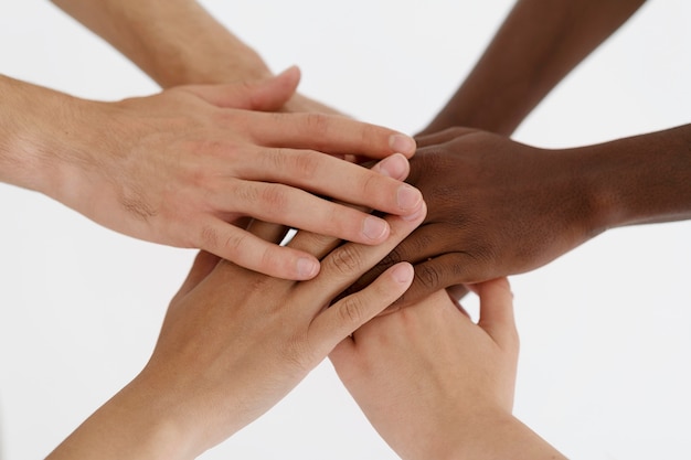 Close up on people connecting through hands