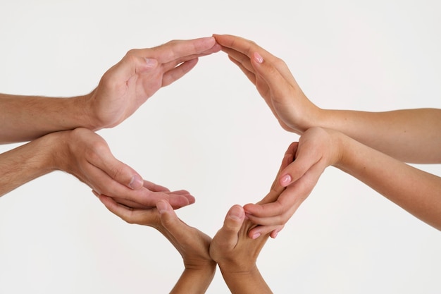 Close up on people connecting through hands