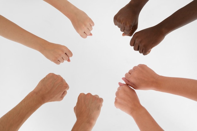 Close up on people connecting through hands