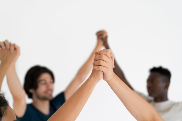 Close up on people connecting through hands