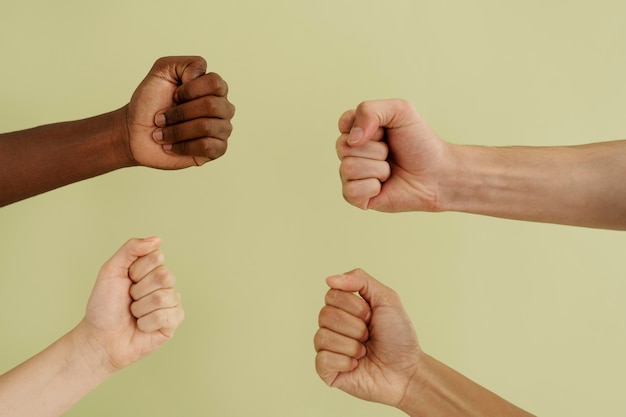 Free photo close up on people connecting through hands