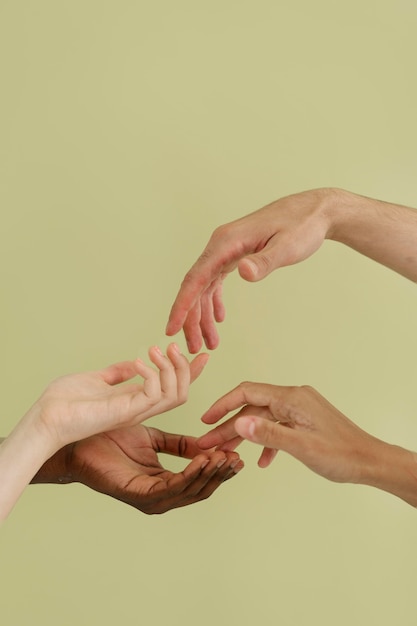 Free photo close up on people connecting through hands