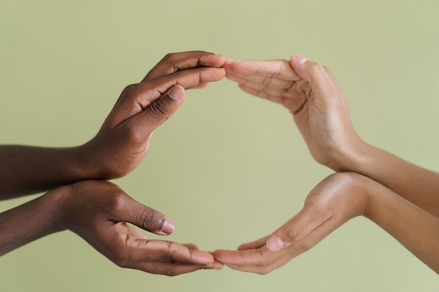 Close up on people connecting through hands