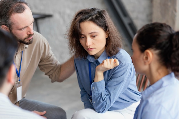 Free photo close up  people discussing in therapy