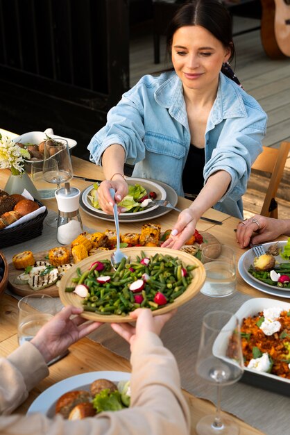 Close up people eating tasty food