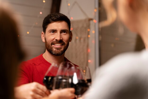 Close up on people enjoying christmas dinner