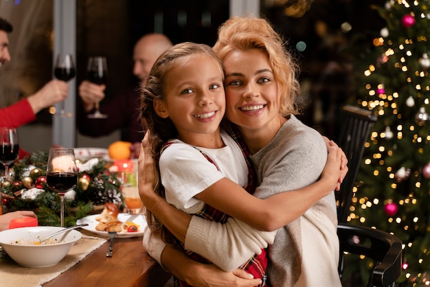 Close up on people enjoying christmas dinner