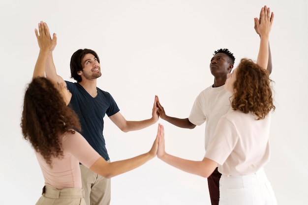 Close up on people getting stronger together