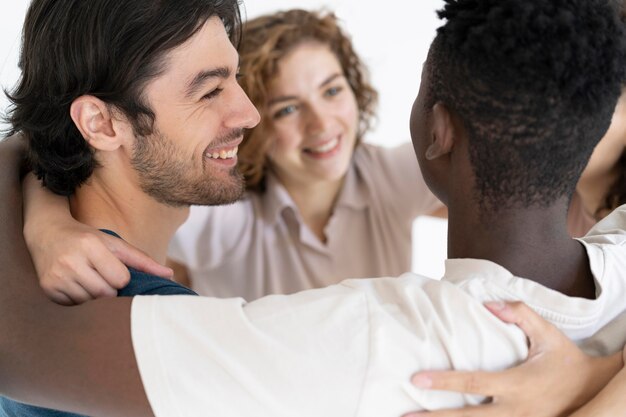 Close up on people getting stronger together