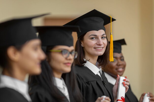 Close up people graduating