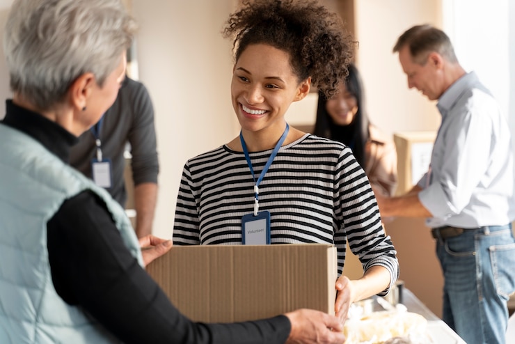 Free Photo close up people holding box