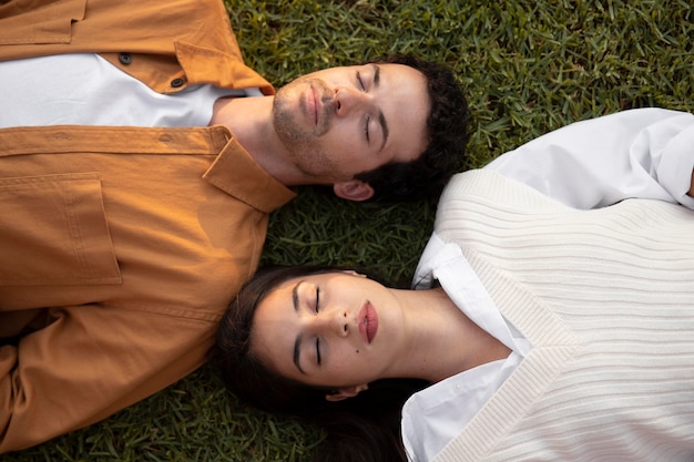 Close up people laying on grass