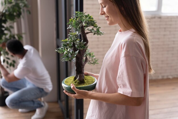 Close up on people making home comfortable