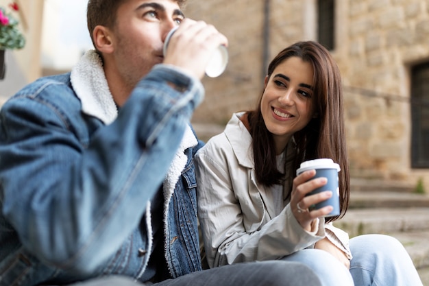 Close up people outdoors with coffee cup