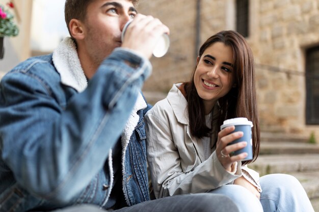 Close up people outdoors with coffee cup