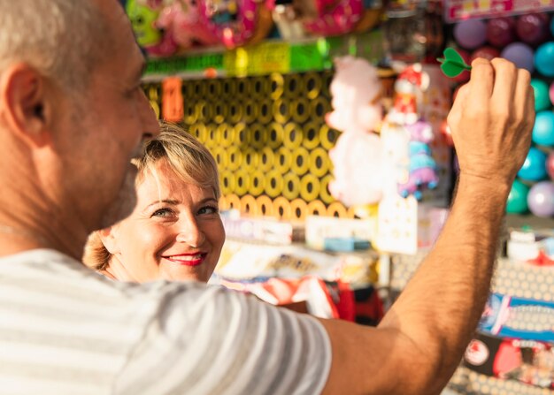 Close-up people picking toys