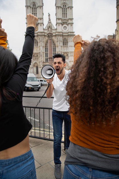 Close up people shouting at protest