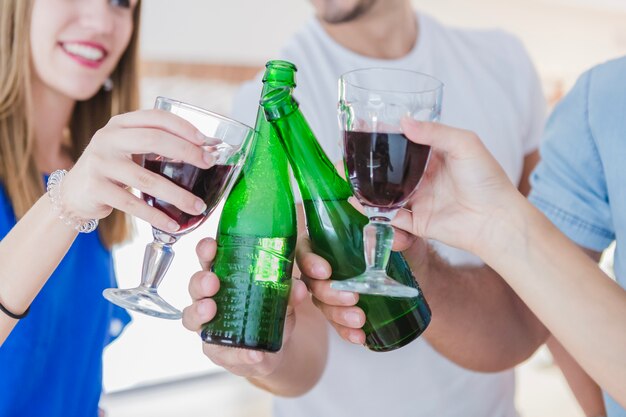 Close-up of people toasting