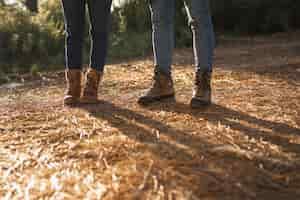 Free photo close-up people with brown boots