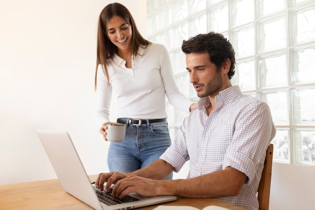 Free photo close up on people working from home